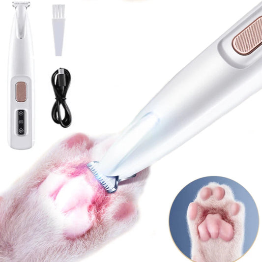 Tondeuse de finition blanche pour pattes de chien, avec sa lumière LED allumée.